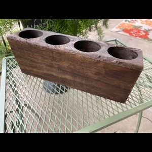 Four hole wooden salt mold.